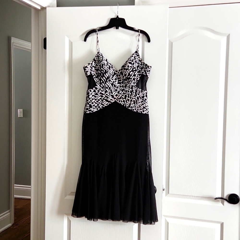 Size 10 J S Collections black and white sheer fabric dress with padded bra.
